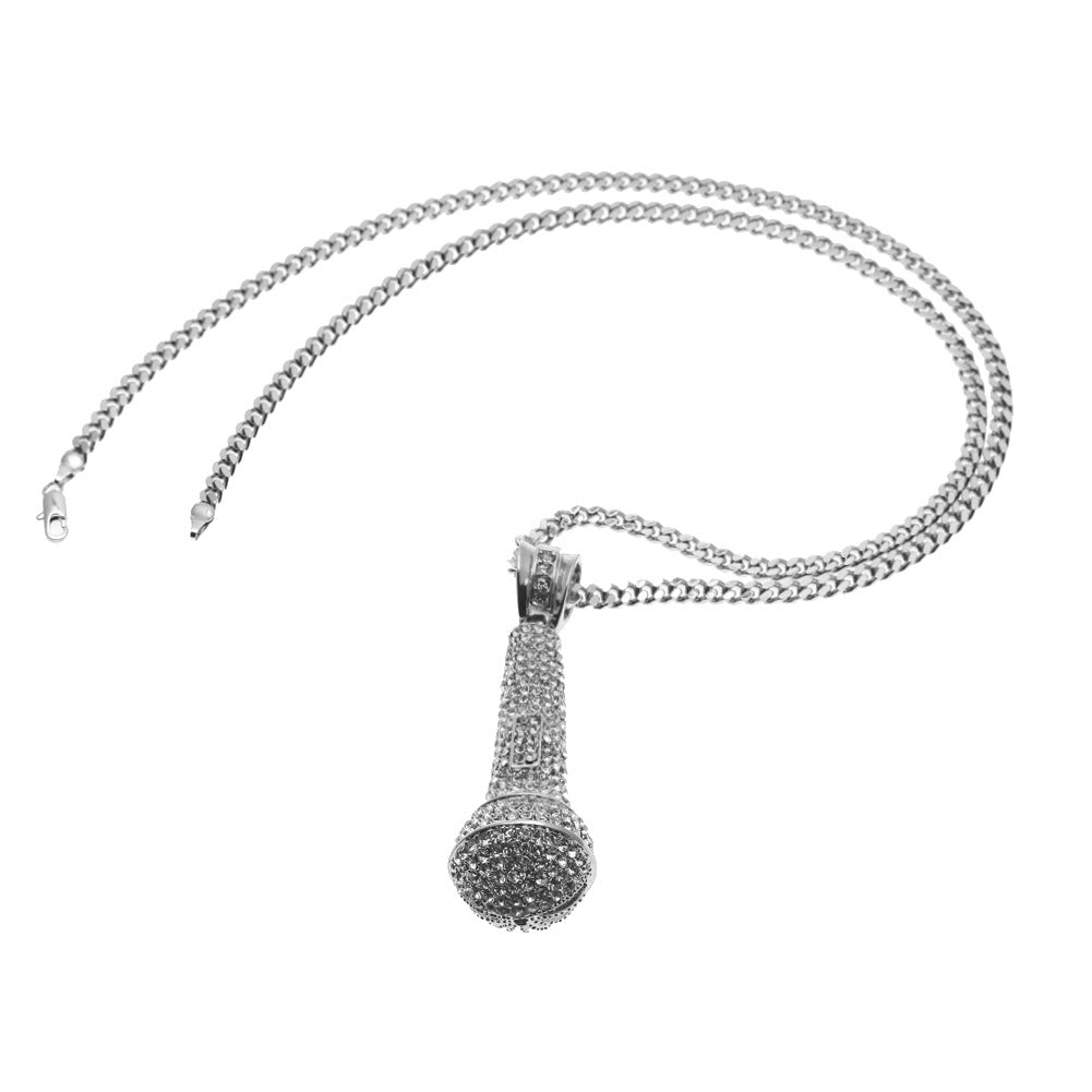 Hip-hop diamond-encrusted microphone necklaces. - MERGE.DAY.1.FREESTYLE