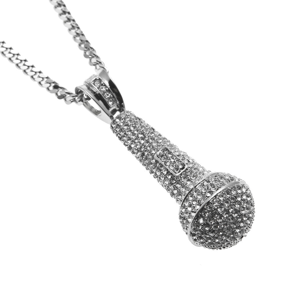 Hip-hop diamond-encrusted microphone necklaces. - MERGE.DAY.1.FREESTYLE