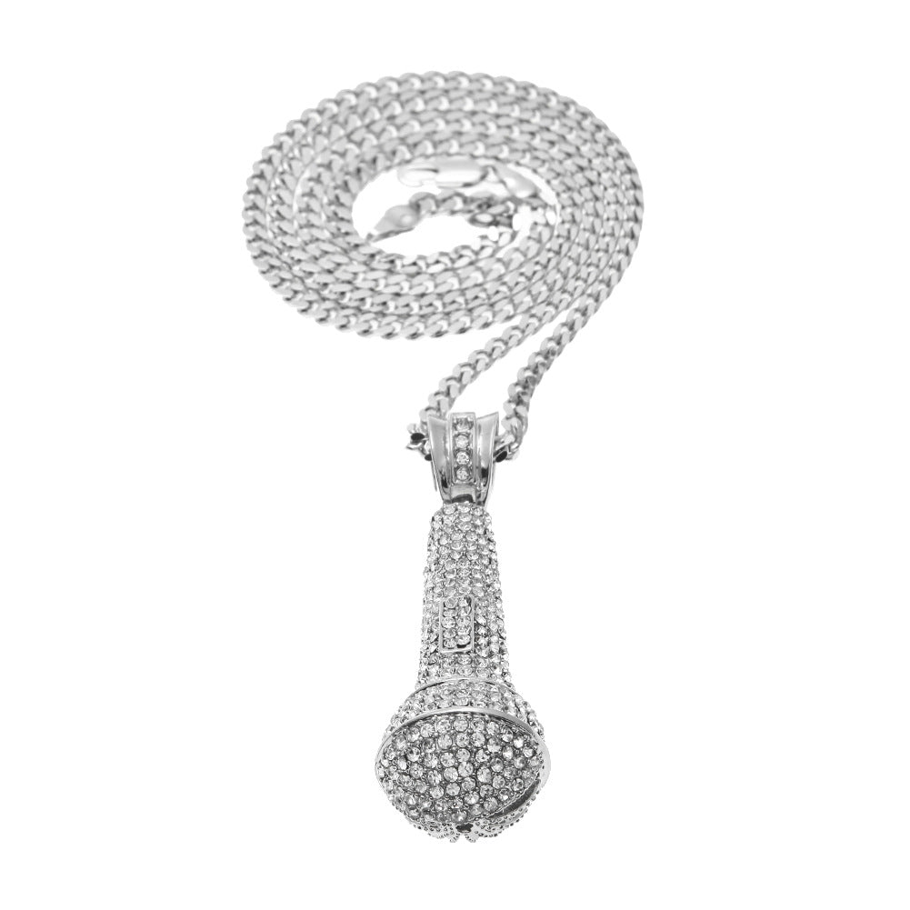Hip-hop diamond-encrusted microphone necklaces. - MERGE.DAY.1.FREESTYLE