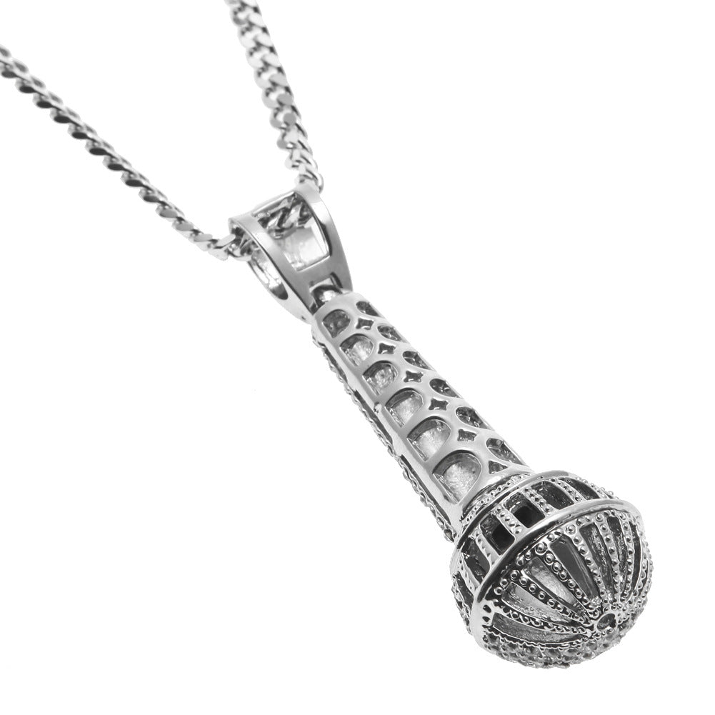 Hip-hop diamond-encrusted microphone necklaces. - MERGE.DAY.1.FREESTYLE