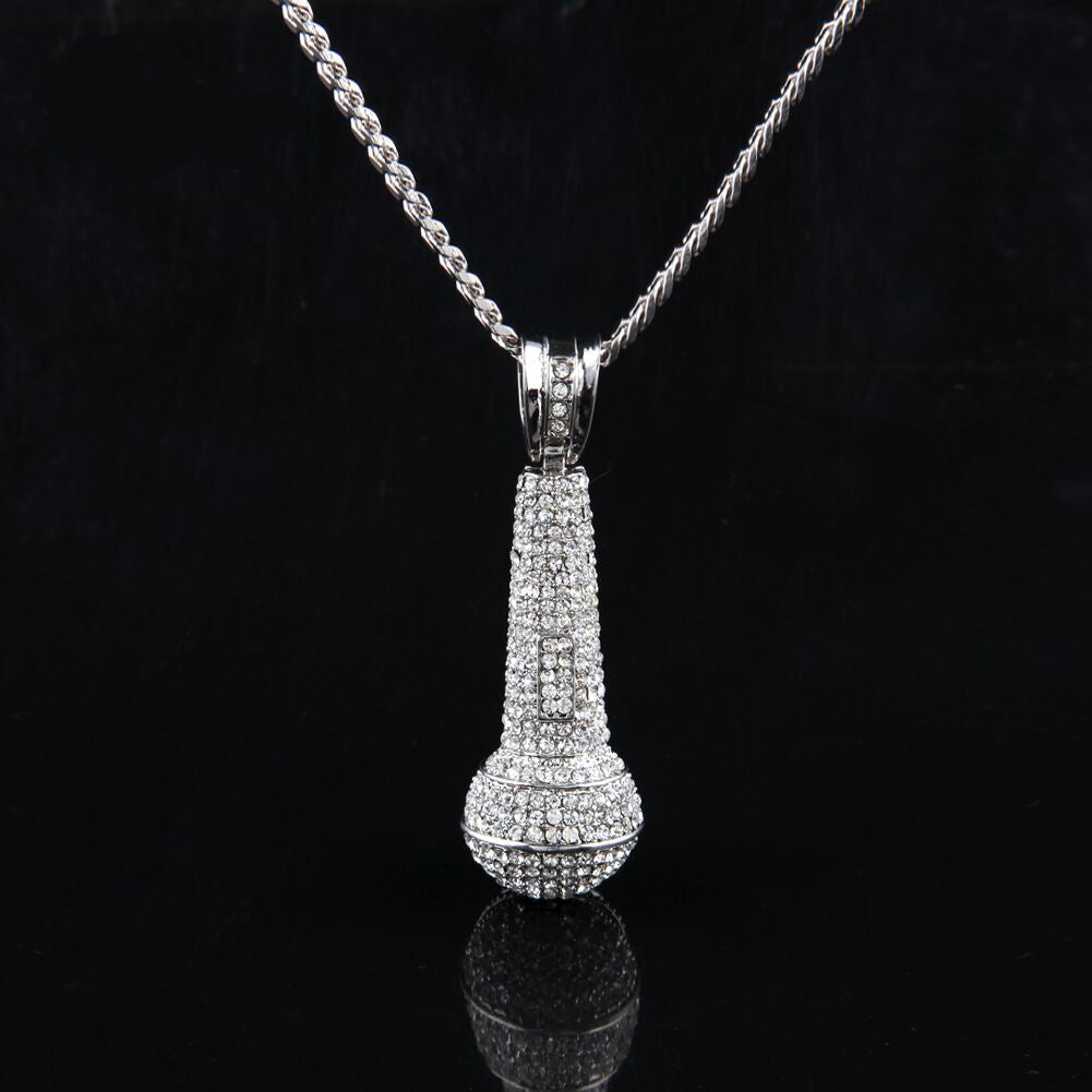 Hip-hop diamond-encrusted microphone necklaces. - MERGE.DAY.1.FREESTYLE