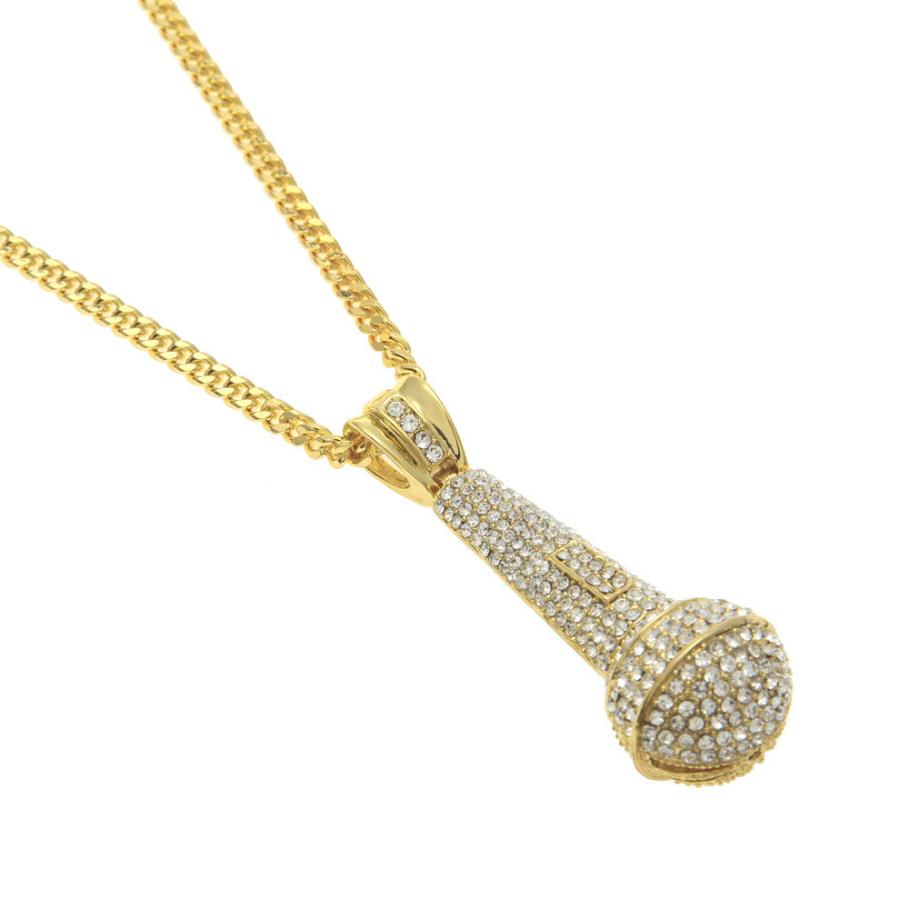 Hip-hop diamond-encrusted microphone necklaces. - MERGE.DAY.1.FREESTYLE