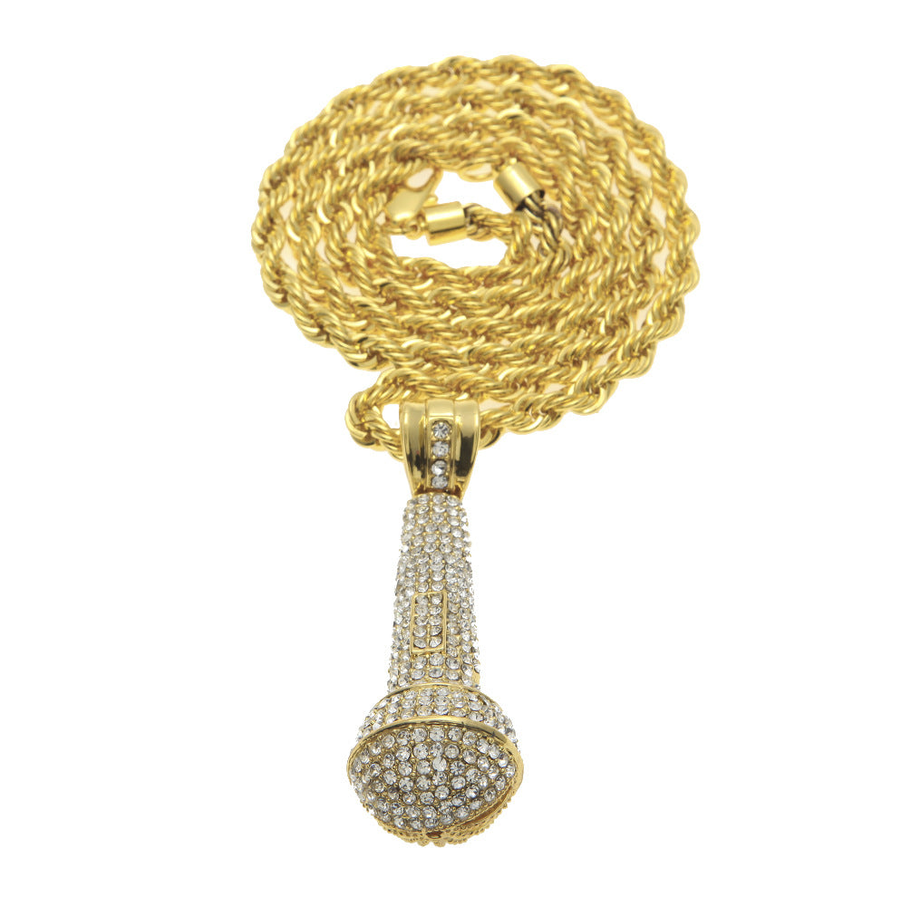 Hip-hop diamond-encrusted microphone necklaces. - MERGE.DAY.1.FREESTYLE