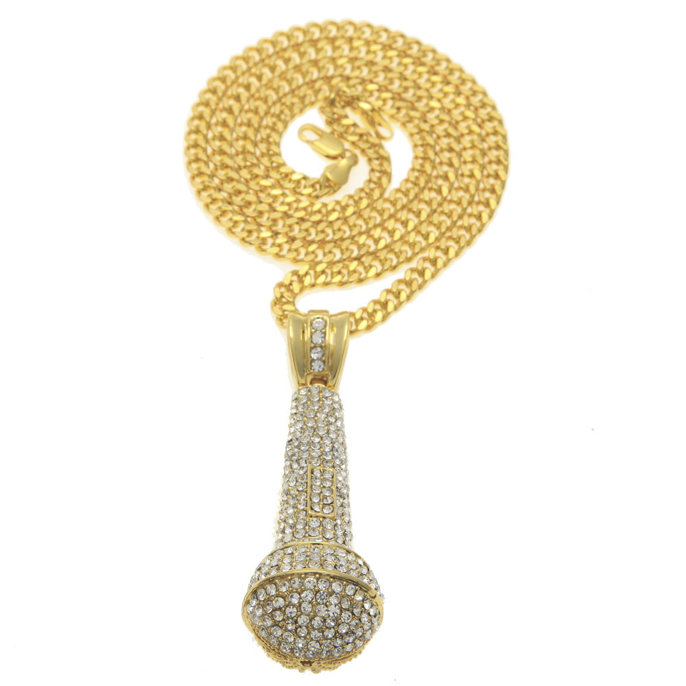 Hip-hop diamond-encrusted microphone necklaces. - MERGE.DAY.1.FREESTYLE