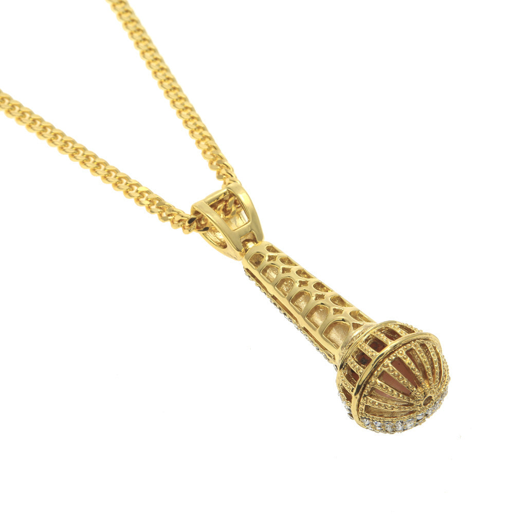 Hip-hop diamond-encrusted microphone necklaces. - MERGE.DAY.1.FREESTYLE