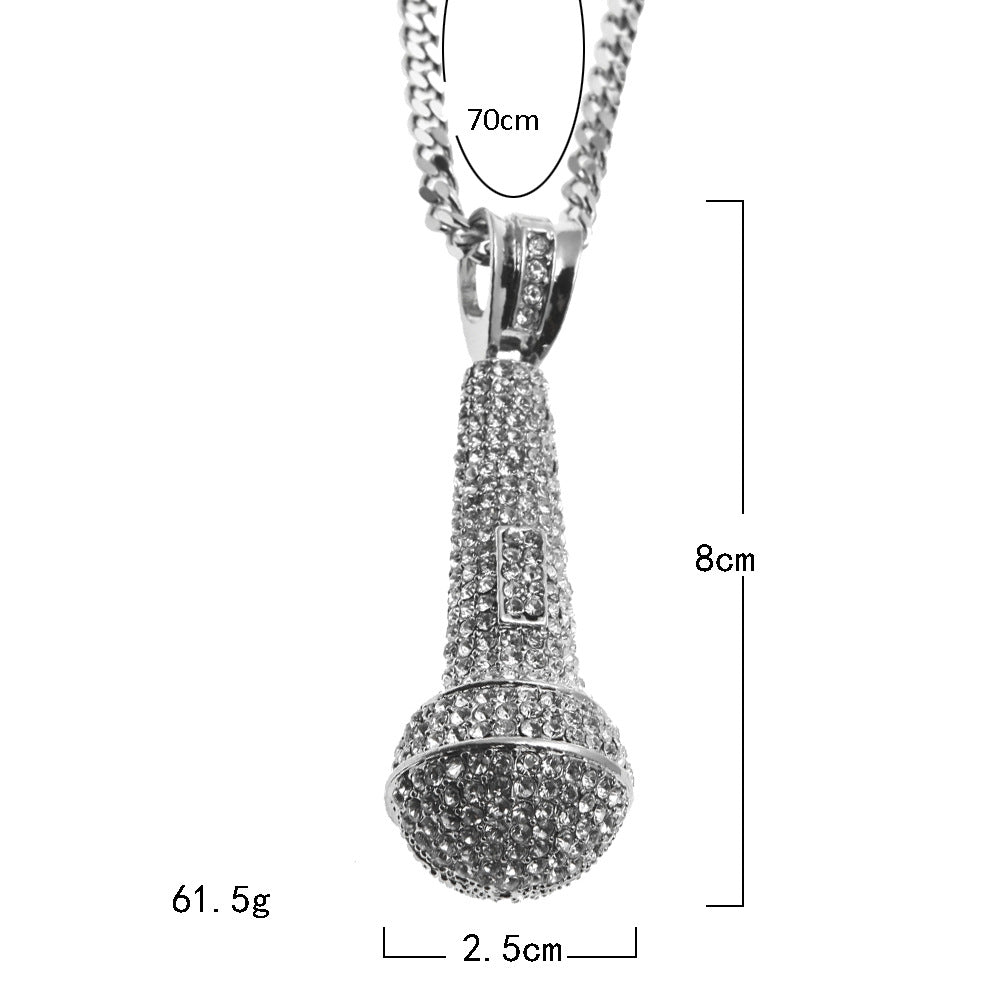 Hip-hop diamond-encrusted microphone necklaces. - MERGE.DAY.1.FREESTYLE