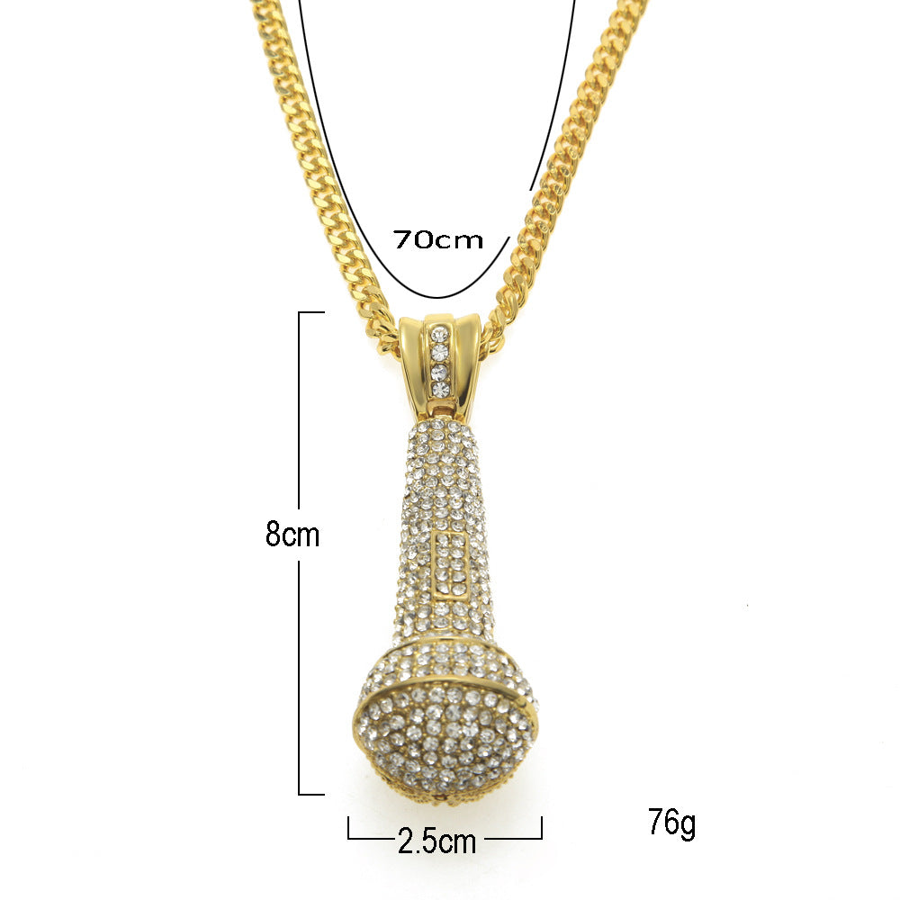 Hip-hop diamond-encrusted microphone necklaces. - MERGE.DAY.1.FREESTYLE
