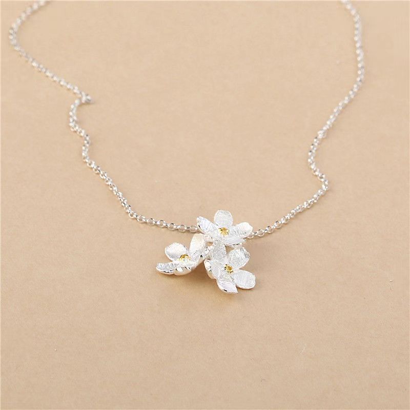 triangle forget me not necklace - MERGE.DAY.1.FREESTYLE