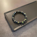 Irregular black gallstone stitching bracelet - MERGE.DAY.1.FREESTYLE