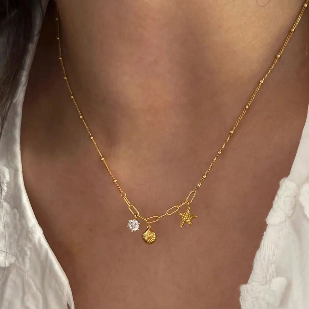 Small starfish shell zircon necklace - MERGE.DAY.1.FREESTYLE