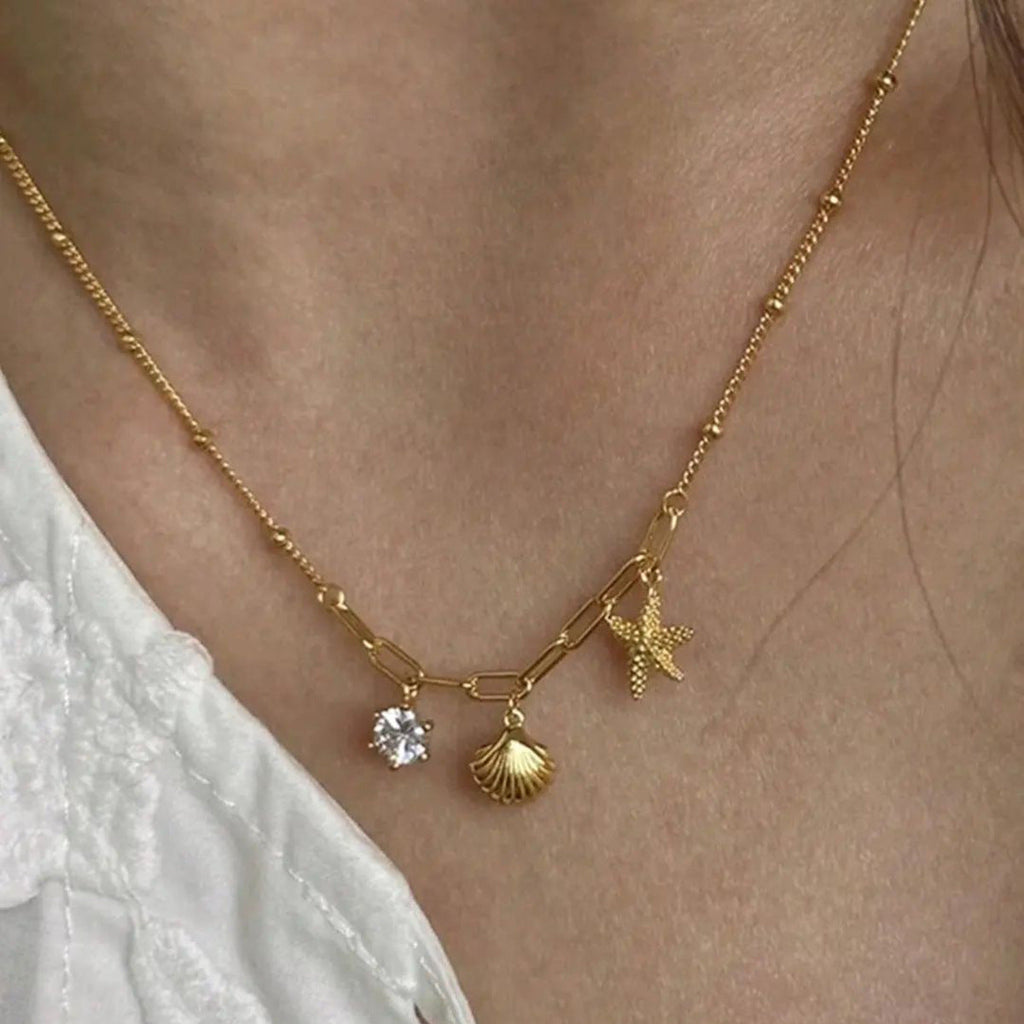 Small starfish shell zircon necklace - MERGE.DAY.1.FREESTYLE