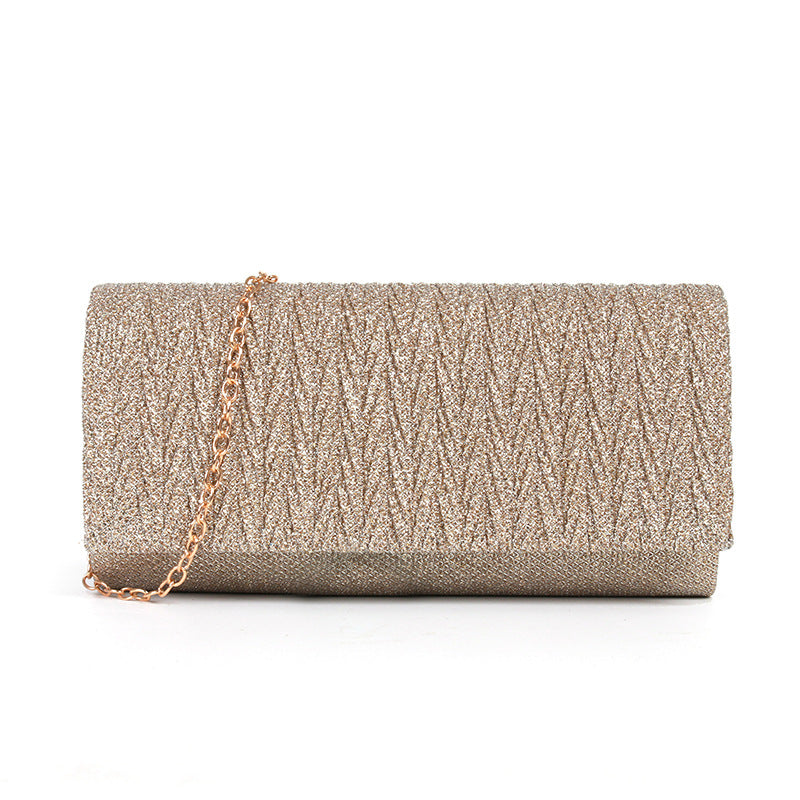 Fantasy shiny pleated clutch bag - MERGE.DAY.1.FREESTYLE