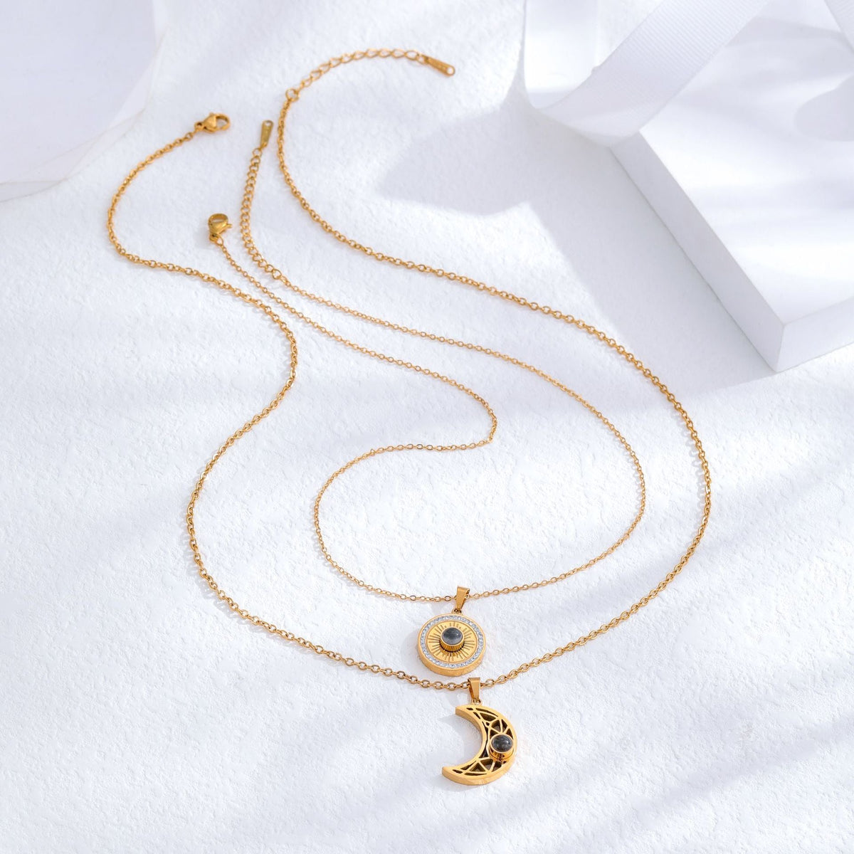 Gold sun and moon projection matching necklaces for couples - MERGE.DAY.1.FREESTYLE