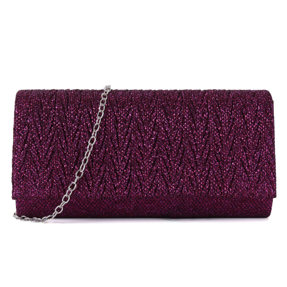Fantasy shiny pleated clutch bag - MERGE.DAY.1.FREESTYLE