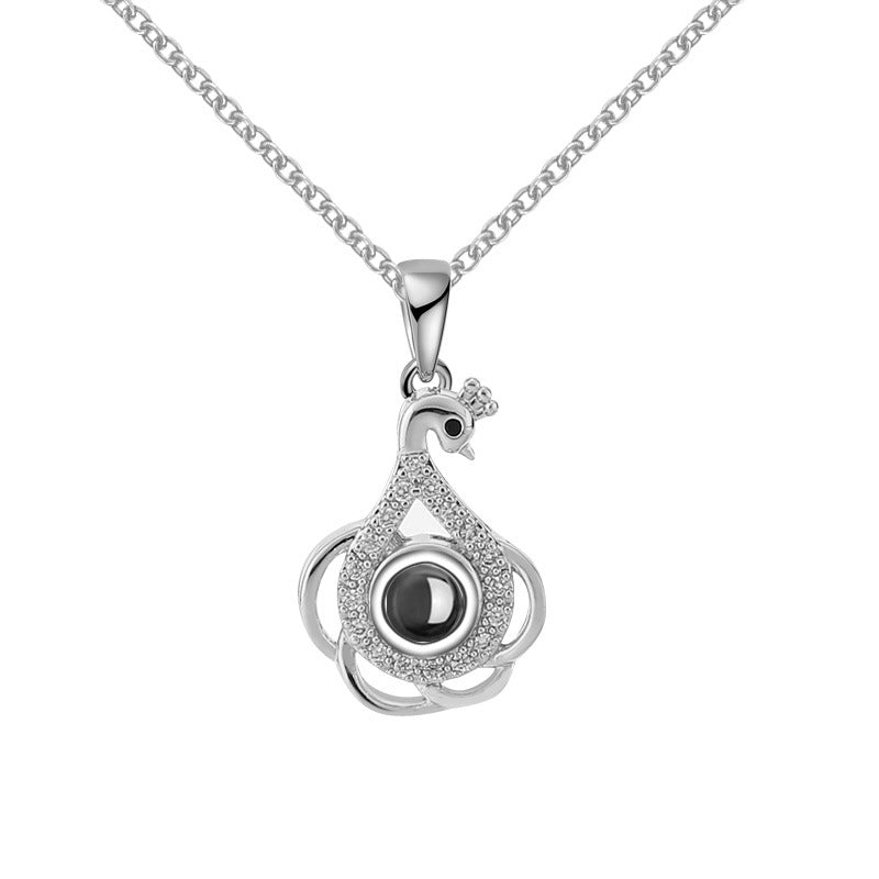 Swan projection necklace with Diamonds - MERGE.DAY.1.FREESTYLE