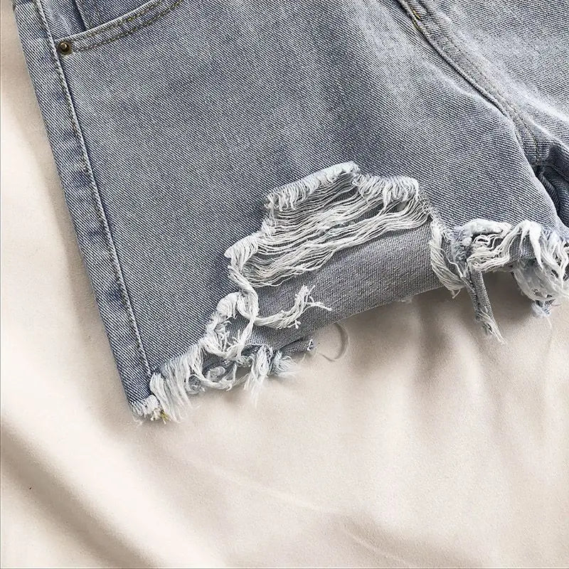 Pocket Tassel Perforated Denim Shorts Female - MERGE.DAY.1.FREESTYLE