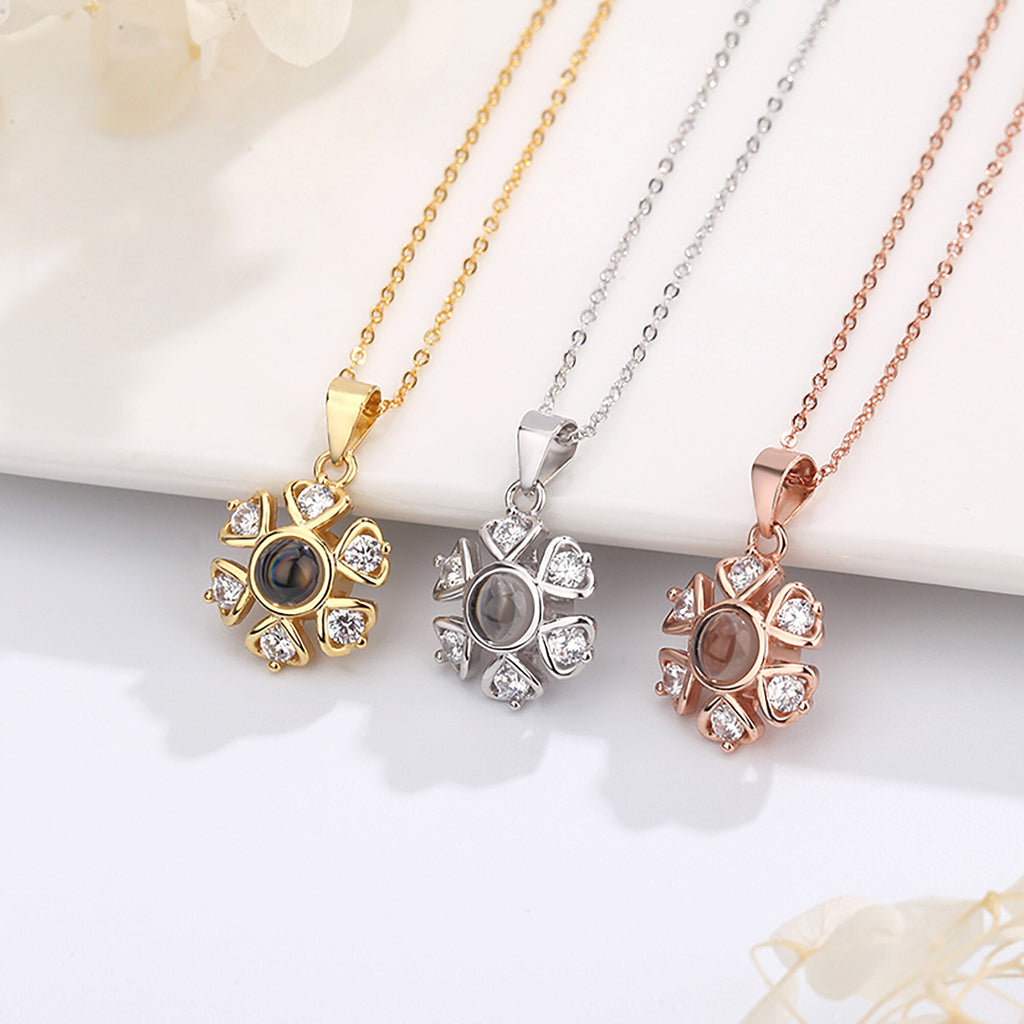 Snow projection necklace with customizable photos Projection Necklace - MERGE.DAY.1.FREESTYLE