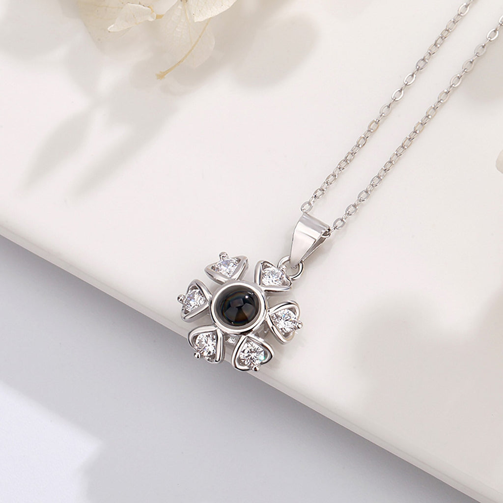 Snow projection necklace with customizable photos Projection Necklace - MERGE.DAY.1.FREESTYLE