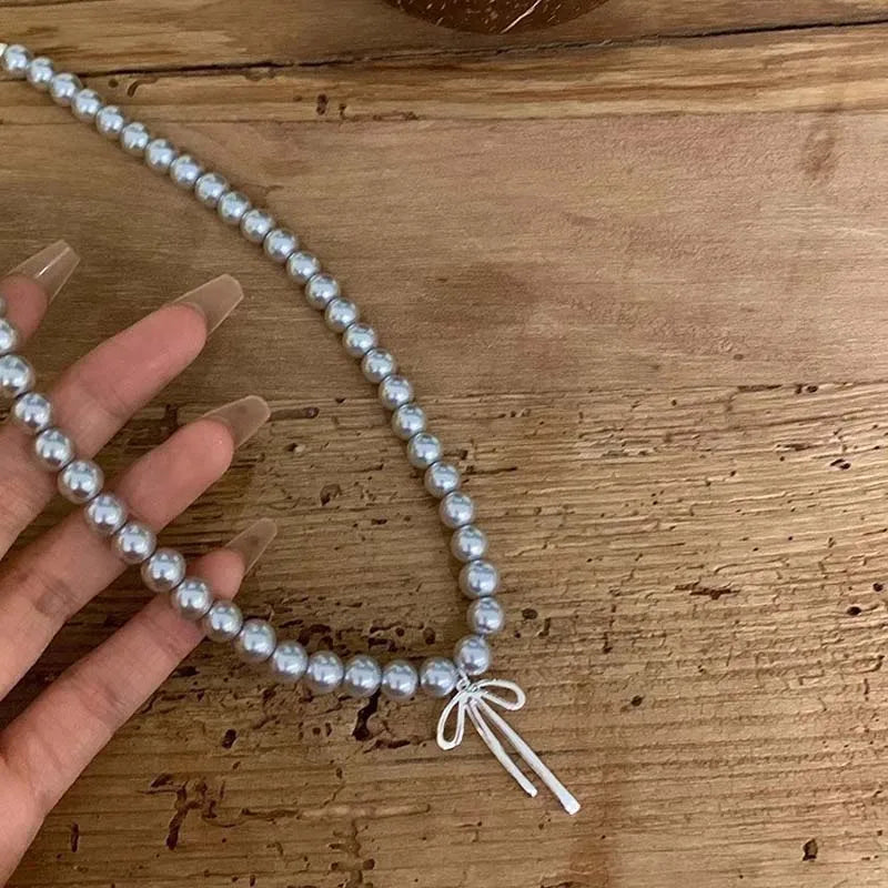 Vintage Grey Pearl Bowknot Pendant Necklace - MERGE.DAY.1.FREESTYLE