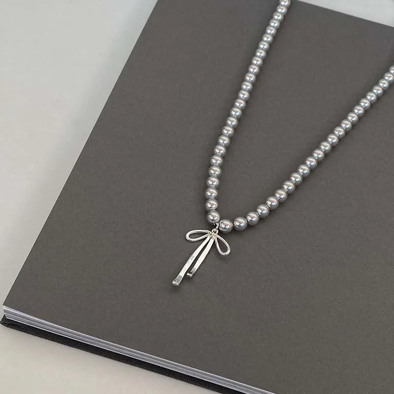 Vintage Grey Pearl Bowknot Pendant Necklace - MERGE.DAY.1.FREESTYLE